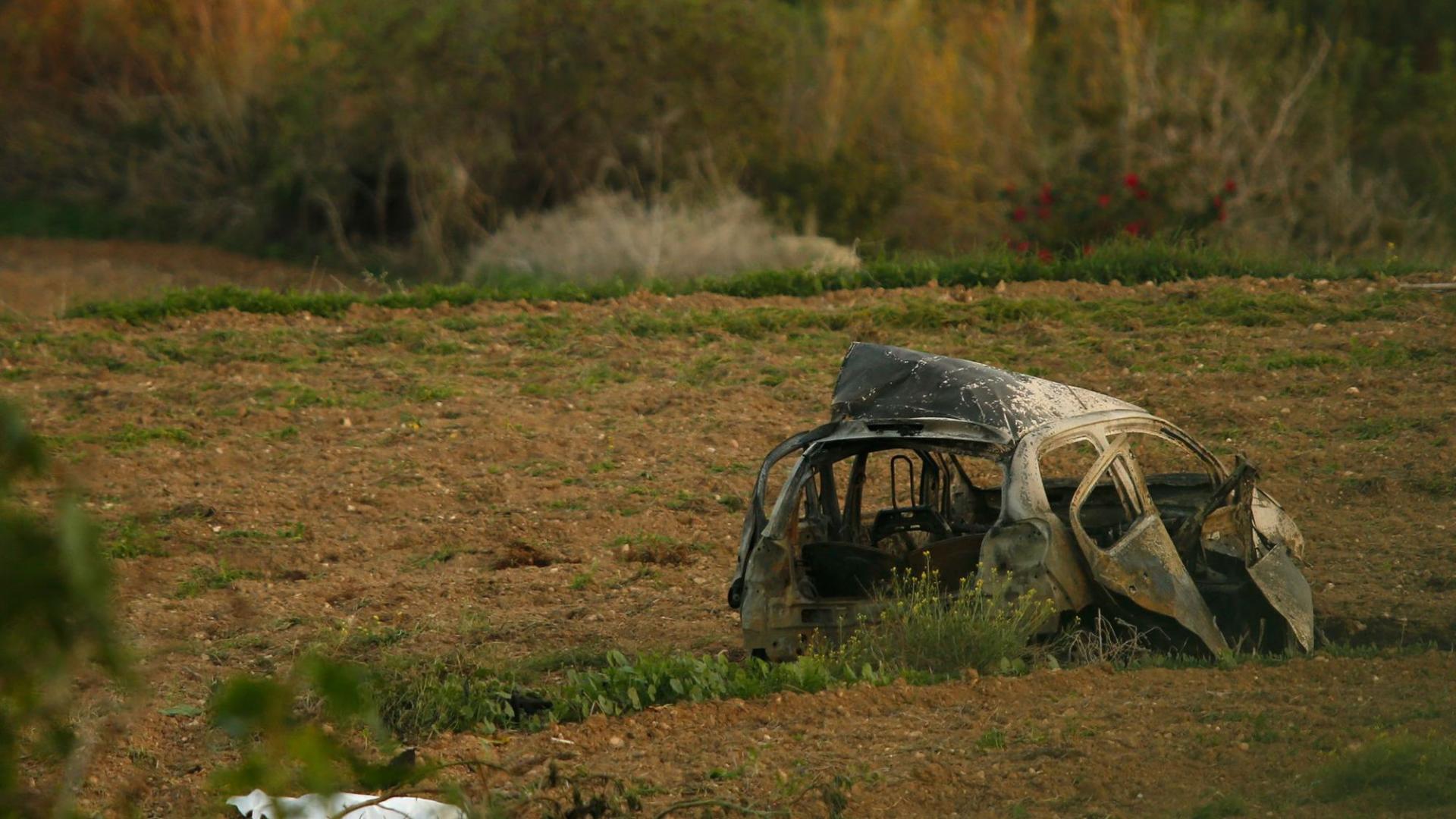 A white sheet covers the body of investigative journalist daphne caruana galizia after a powerful bomb blew up a car killing her in bidnija 5962040